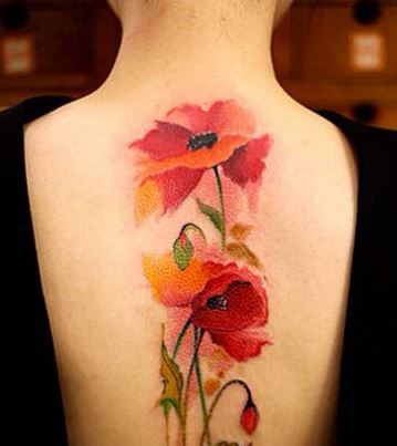 女性背部罂粟花人体彩绘纹身图片