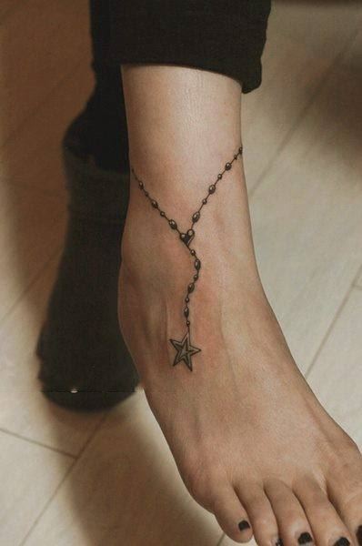 美女脚踝上黑色五角星脚链纹身图案图片